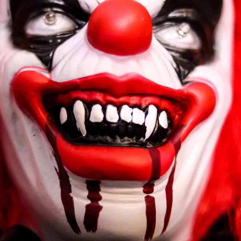 Haunted Hill Farm 5-ft. Animatronic Clown, Indoor/Covered Outdoor Halloween Decoration, Red LED Eyes, Poseable, Hell Raiser