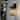 KAWOTI 1-Light Black Dusk to Dawn Outdoor Wall Lantern Sconce with Photocell - W5.7"×E6.25"×H14.25"