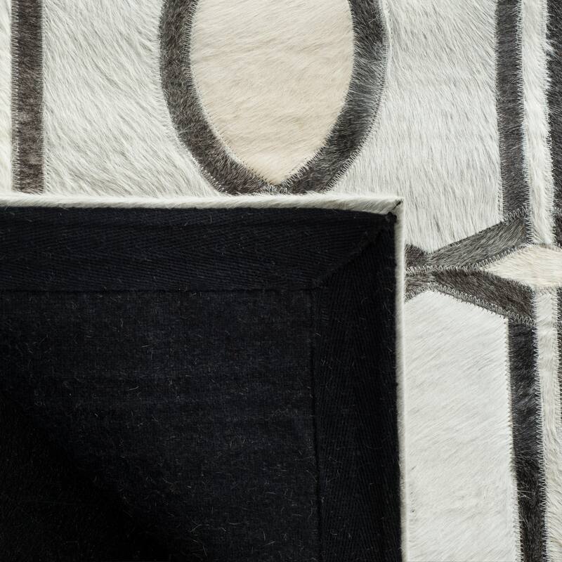 SAFAVIEH Handmade Studio Leather Mandie Modern Leather Rug