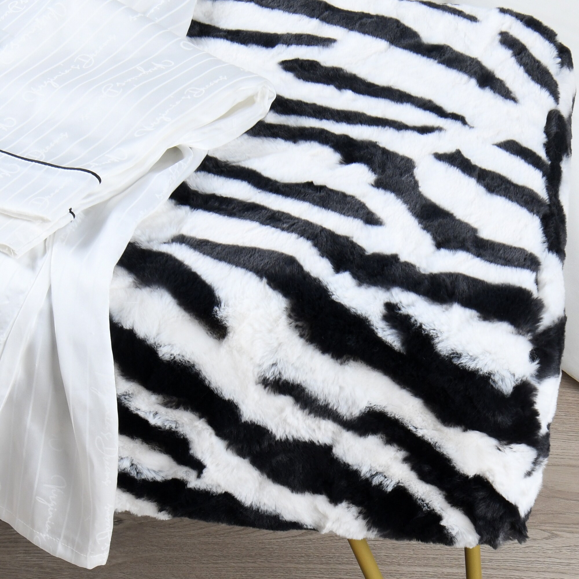 Home Soft Things Zebra Fauxfur Ottoman with Gold Metal Legs. - Picture 8 of 14