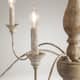 The Gray Barn Farmhouse 6-Light 29.5" Distressed Wood Curve Arm French Country Chandelier
