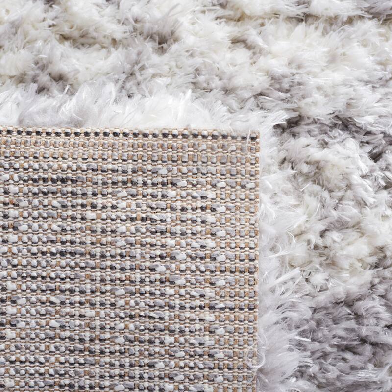 SAFAVIEH Handmade Flokati Yaffa Shag Solid Polyester Rug