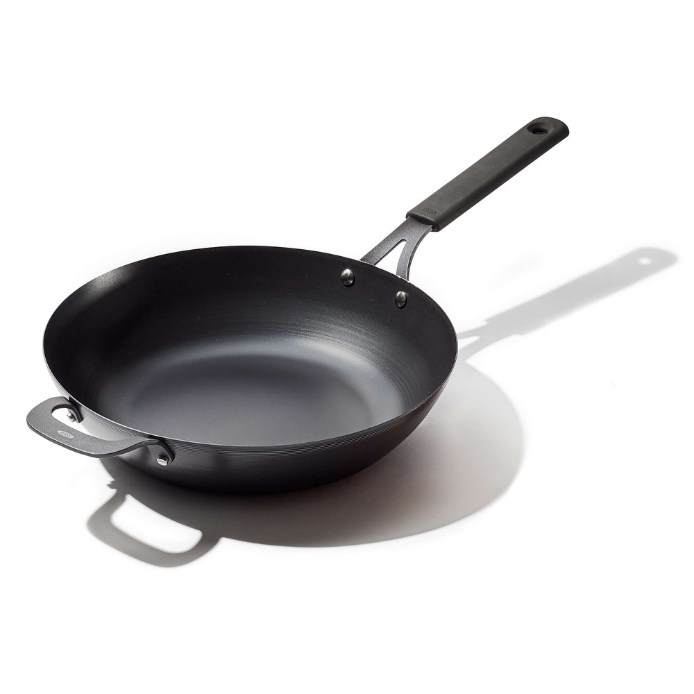 https://ak1.ostkcdn.com/images/products/is/images/direct/6ea1dfc152a70b101a80fc6e54e94b51dde454ff/OXO-Black-Steel-12%22-Wok-with-Helper-Handle-%26-Silicone-Sleeve.jpg
