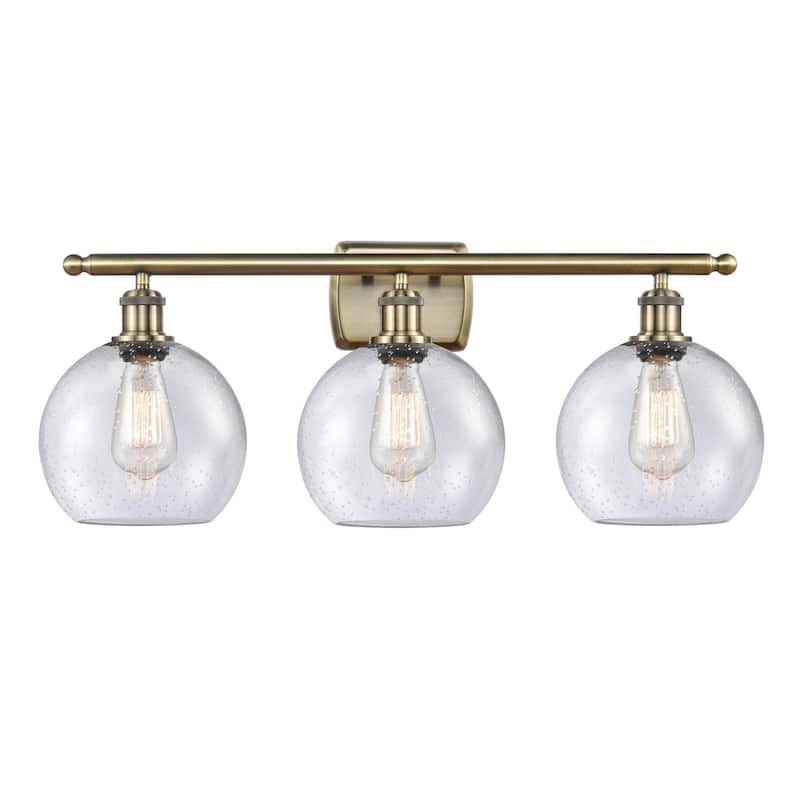 Innovations Lighting 516-3W-13-26 Athens Vanity Athens 3 Light 26" - Antique Brass / Seedy