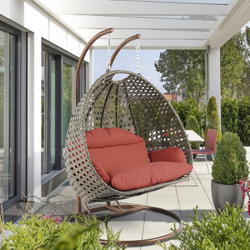 LeisureMod Modern 2-Person Egg Hanging Swing Chair with Beige Wicker, Oxford Fabric Cover, Patio Hammock Lounger and Cushions