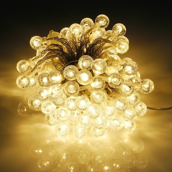 White globe string shop lights