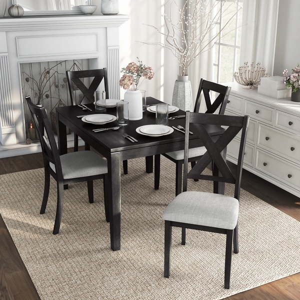 farmhouse table and black chairs