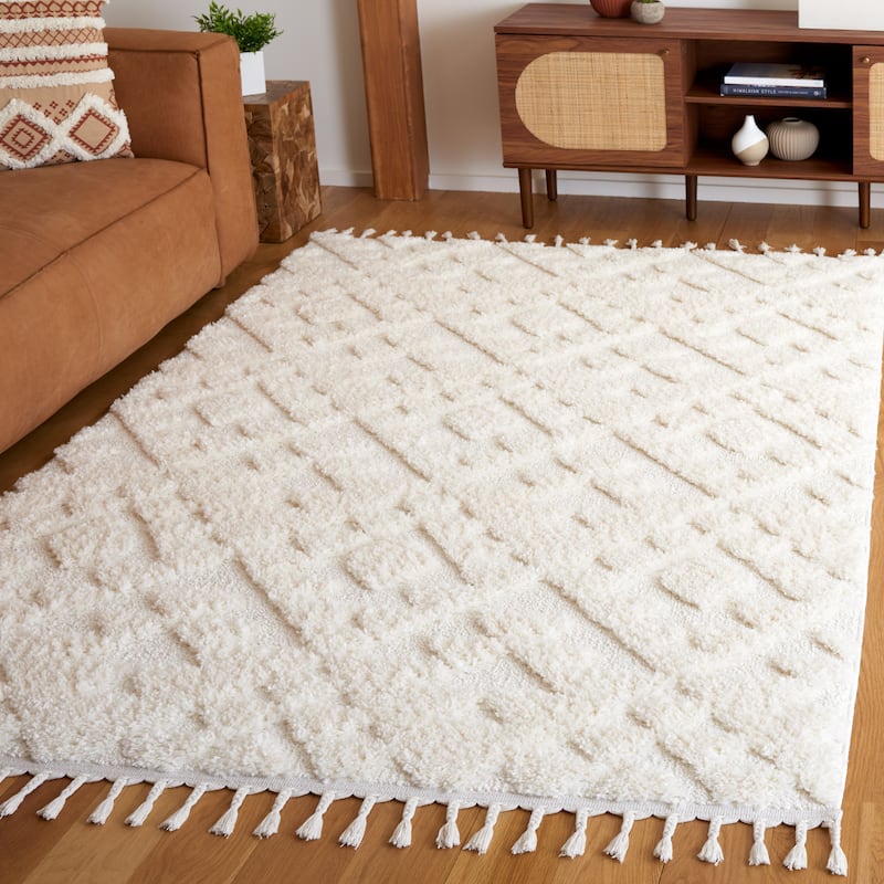 SAFAVIEH Moroccan Tassel Shag Kobi 2-inch Thick Rug - 6'7" x 9'2" - Ivory - Rectangle