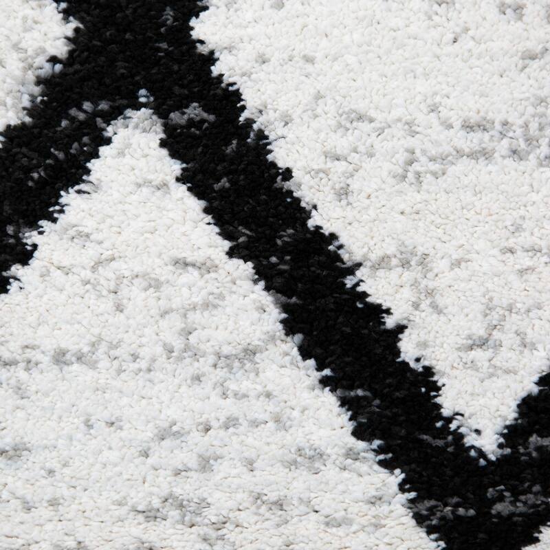 Carson Carrington Salsaker Geometric Area Rug