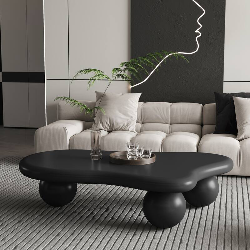47 Inch Cloud Shaped Coffee Table with 3 Ball Legs - Black