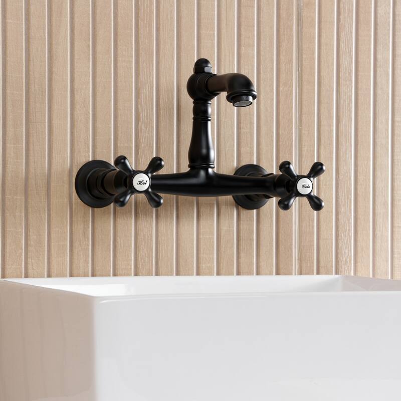 Kingston Brass English Country Two-Handle 2-Hole Wall Mount Bathroom Faucet