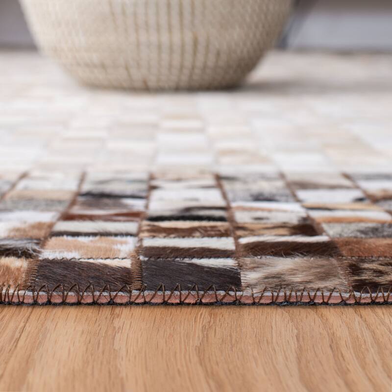 SAFAVIEH Handmade Studio Leather Mistie Natural Hide Leather Rug