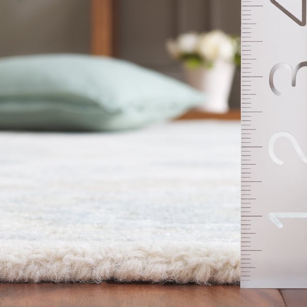 dimension image slide 1 of 3, SAFAVIEH Hand-Tufted Ebony Zhanat Modern & Contemporary Wool Rug