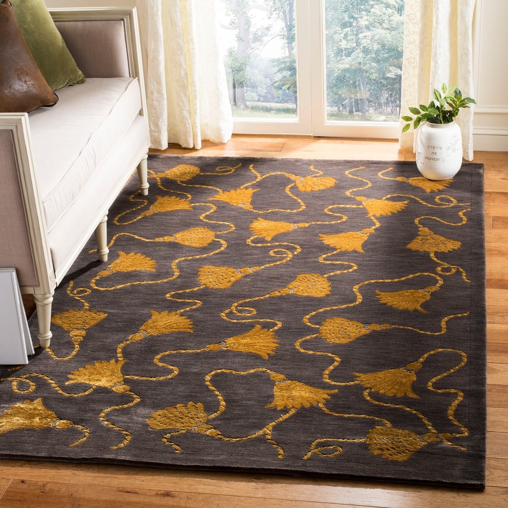 SAFAVIEH Couture Hand-knotted Tibetan Pierpaola Modern Wool Rug