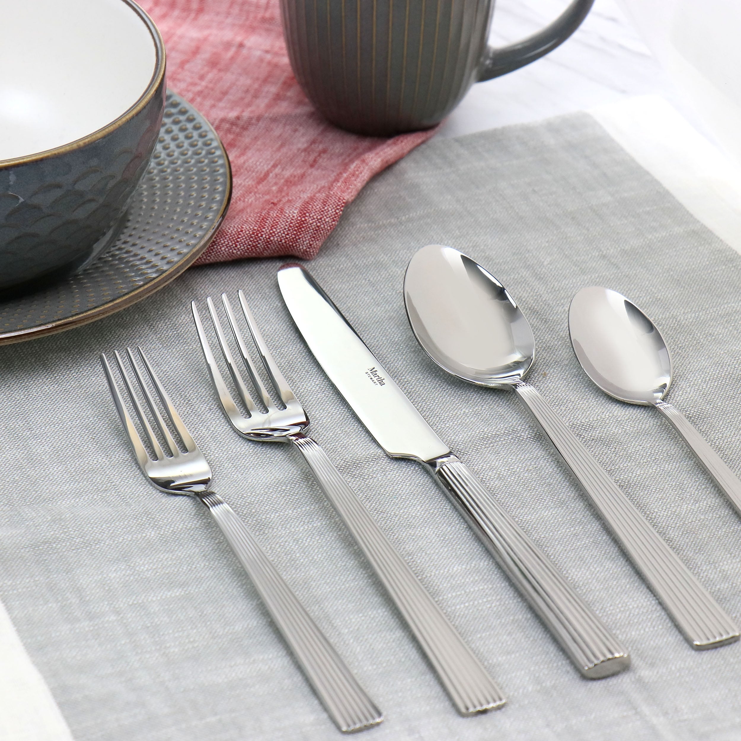 https://ak1.ostkcdn.com/images/products/is/images/direct/7035daf2487111912f67369d943066a5e5eb3356/Martha-Stewart-Carlyle-20-Piece-Flatware-Set.jpg