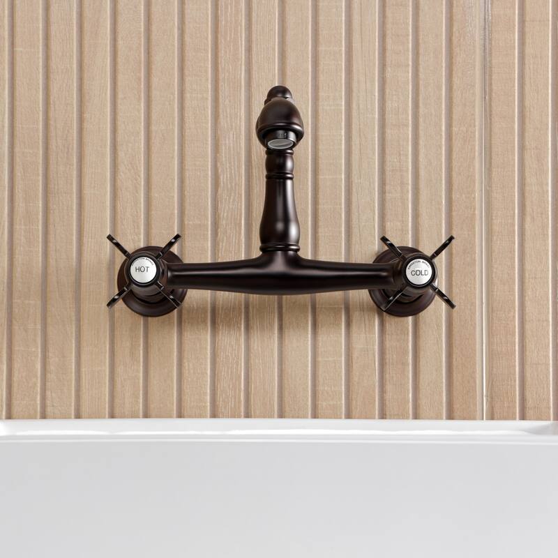 Kingston Brass Essex Two-Handle 2-Hole Wall Mount Bathroom Faucet
