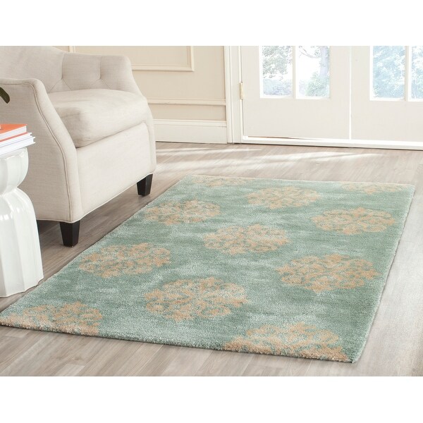 Safavieh Handmade Soho Teja Medallion N.Z. Wool Rug. Opens flyout.