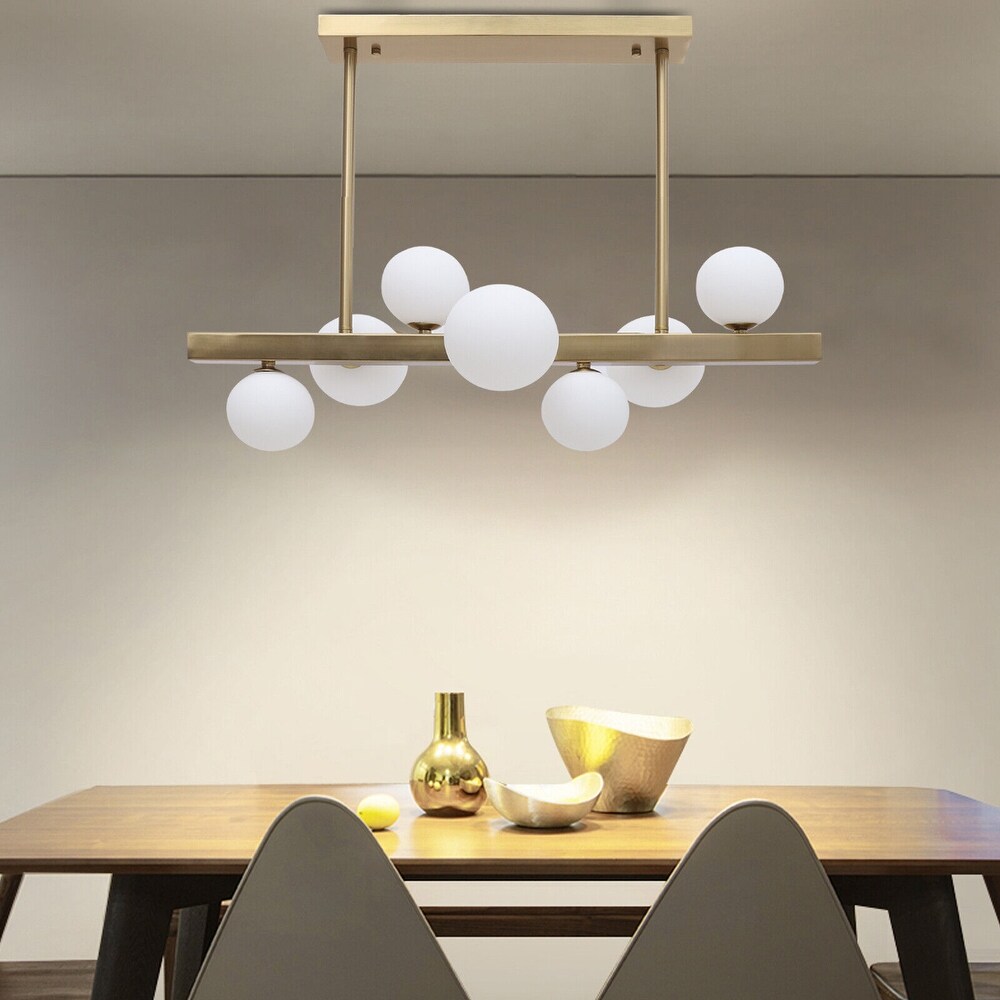 https://ak1.ostkcdn.com/images/products/is/images/direct/7090b1f2b5cce430b78e9d82b65f36ef73ec19cd/Modern-linear-7-light-chandelier-kitchen-island-light-glass-lamp.jpg
