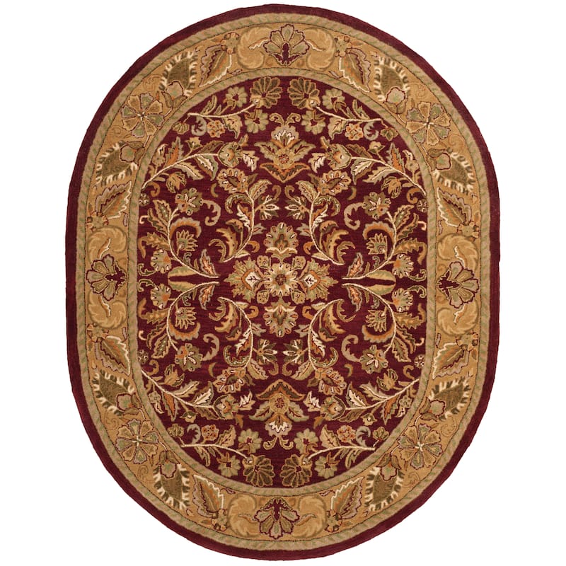 SAFAVIEH Handmade Heritage Gullu Traditional Oriental Wool Rug - 7'6" x 9'6" Oval - Red/Gold