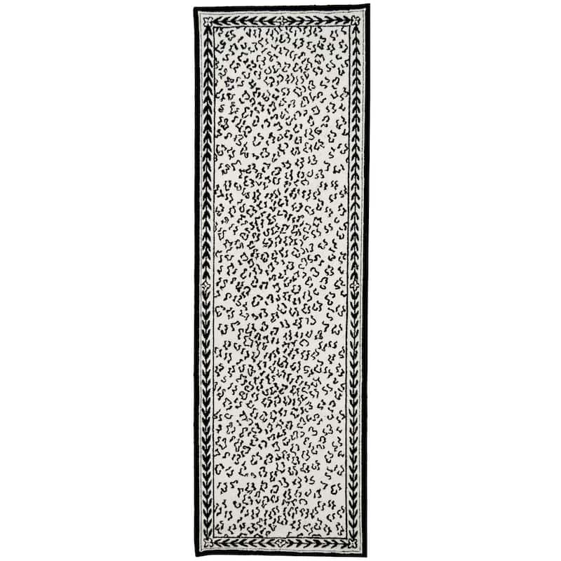 SAFAVIEH Handmade Chelsea Solar Garden Leopard French Country Wool Rug