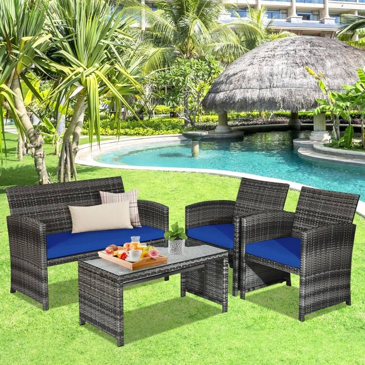 4 Pieces Patio Rattan Furniture Set with Glass Table and Loveseat - 43.5" x 25"x 31" (L x W x H)