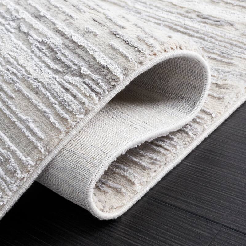 SAFAVIEH Diamond Einfrid Modern Abstract Fringe Rug