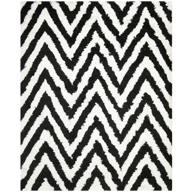 SAFAVIEH Handmade Kanesha Shag Karien Rug
