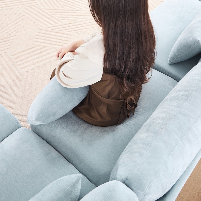 Three seater sofa with lumbar pillow