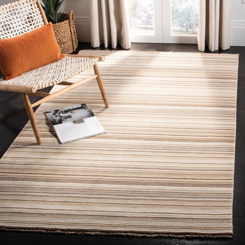 SAFAVIEH Couture Hand-knotted Tibetan Tjipkje Modern Wool Rug