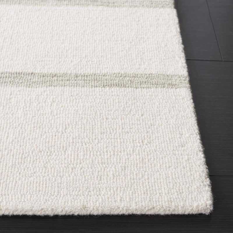 SAFAVIEH Handmade Ebony Gwynedd Mid-Century Modern Wool Rug