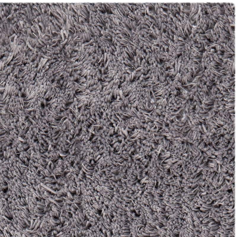 SAFAVIEH Handmade Classic Shag Nakhshun Rug