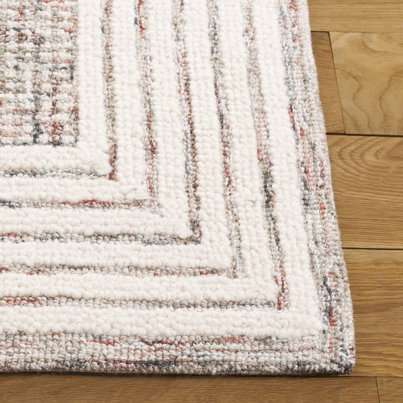 SAFAVIEH Handmade Ebony Dorith Border Wool Rug