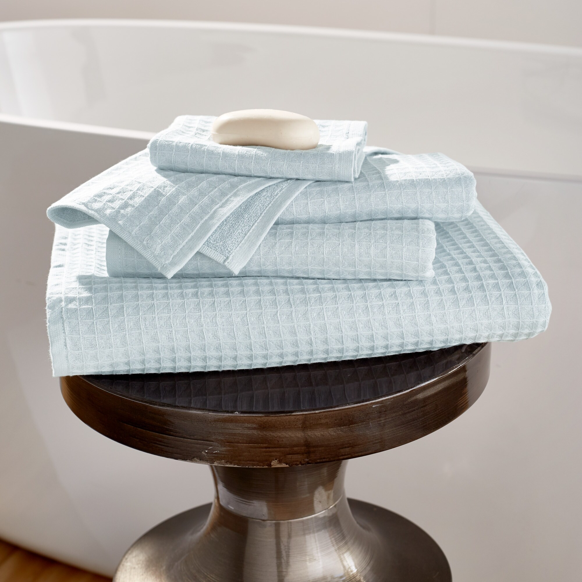 https://ak1.ostkcdn.com/images/products/is/images/direct/71a799fe78e7bddc3bad7c7e2f2455cc7d54433e/Waffle-Twist-Bath-Towel.jpg