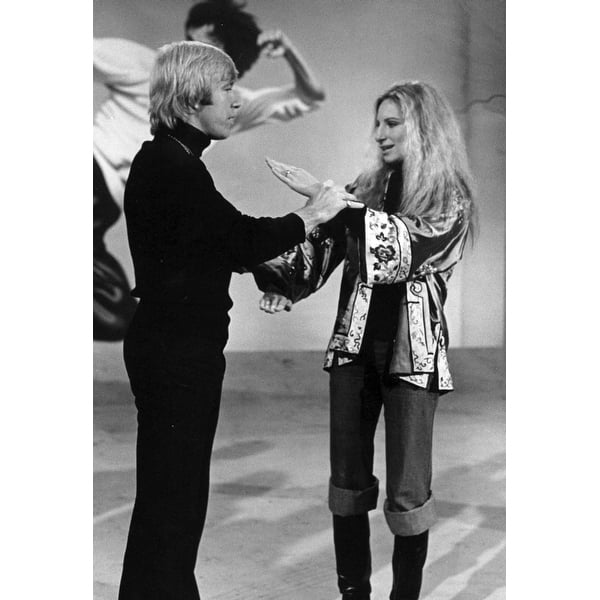 Television still featuring Chuck Norris and Barbra Streisand at a ...