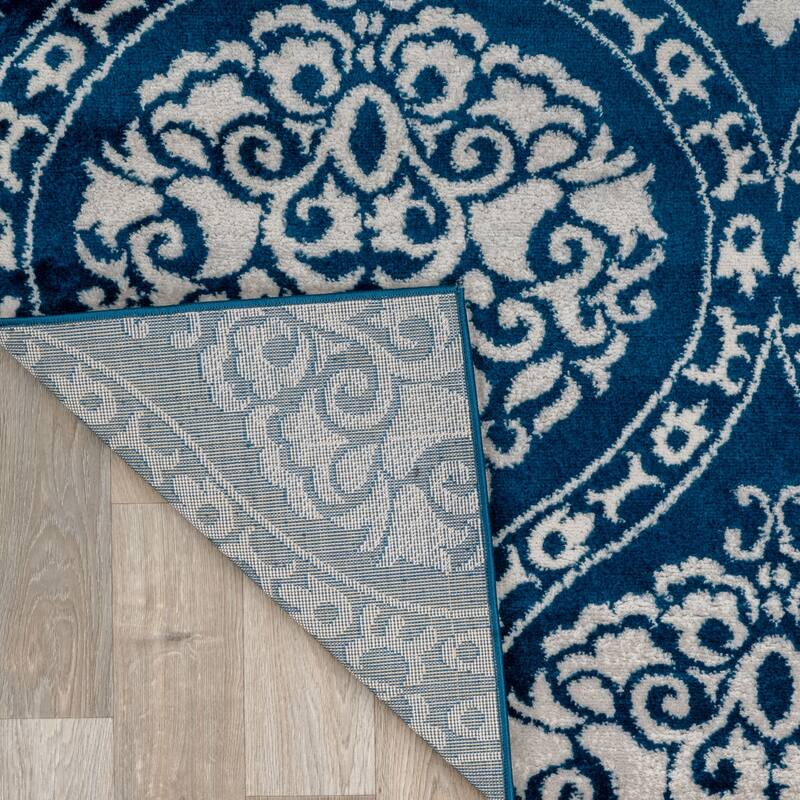 Porch & Den Pascuzzi Distressed Floral Damask Area Rug