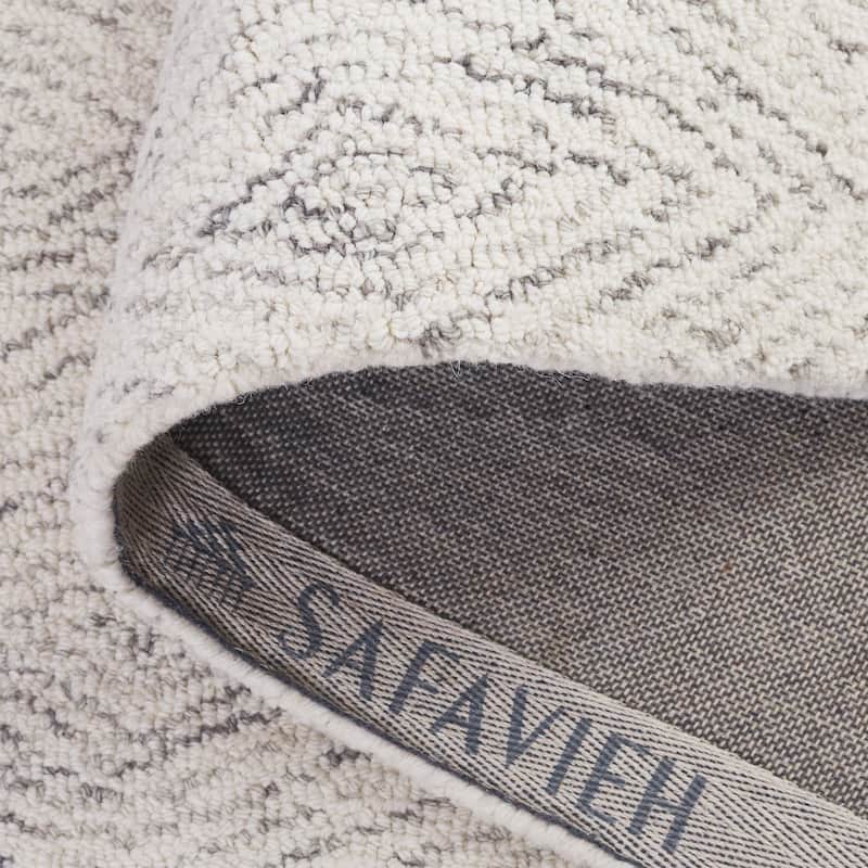 SAFAVIEH Handmade Ebony Herlaug Modern Wool Rug