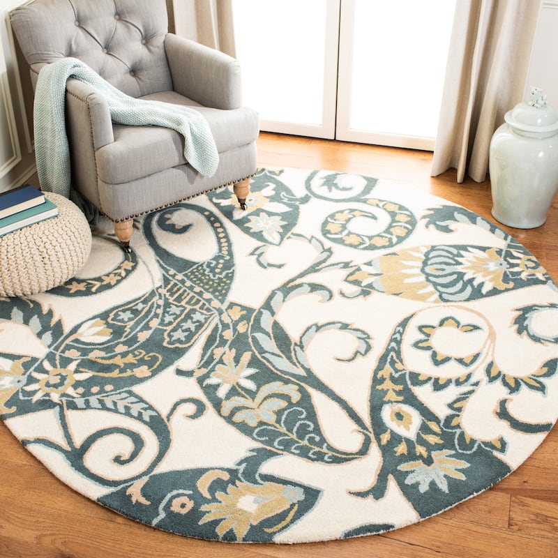 SAFAVIEH Handmade Wyndham Rosaleen Modern Wool Rug - 7' Round - Ivory/Multi