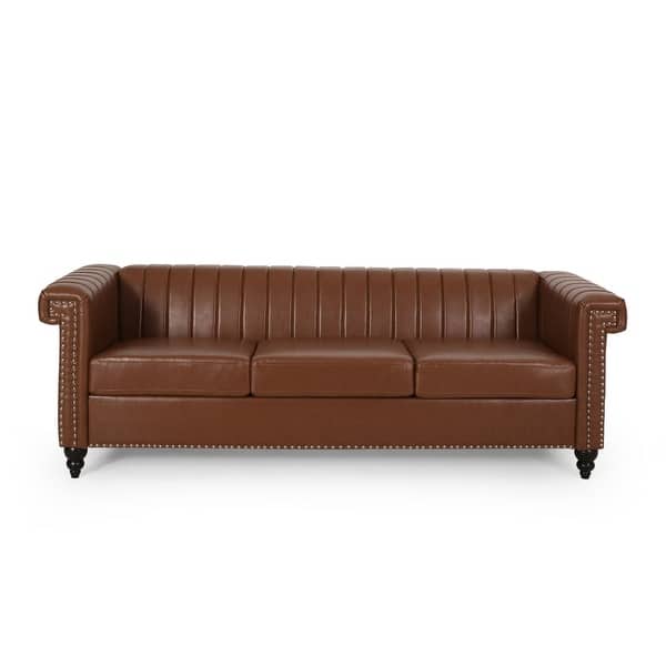 slide 2 of 40, Drury Channel Stitch Faux Leather Sofa with Nailhead Trim by Christopher Knight Home - 83.00" L x 32.50" W x 27.00" H