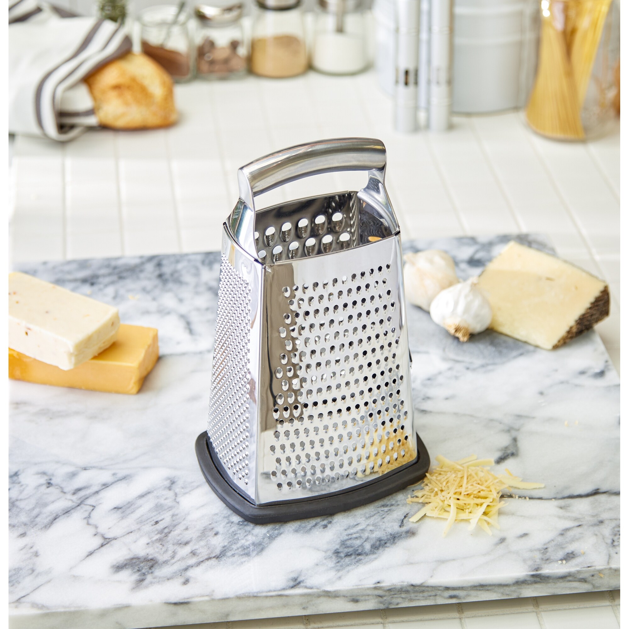 https://ak1.ostkcdn.com/images/products/is/images/direct/720162c6e31e865b421c565ee2432ee326e792eb/Deluxe-Handheld-Box-Grater.jpg