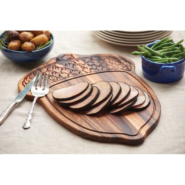 https://ak1.ostkcdn.com/images/products/is/images/direct/720a7aed2f92a08fd64bbc1172359546456078ee/Ironwood-Gourmet-Oak-Nut-Carve-and-Serve-Platter%2C-Acacia-Wood.jpg?impolicy=medium