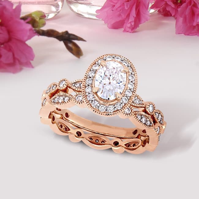 Miadora 1 1/2ct DEW Oval-cut Moissanite Halo Vintage Bridal Ring Set in 10k Rose Gold