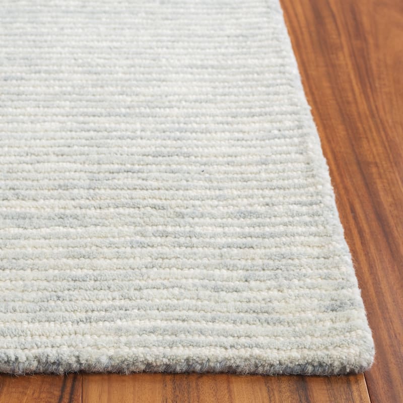 SAFAVIEH Handmade Ebony Sora Wool Rug