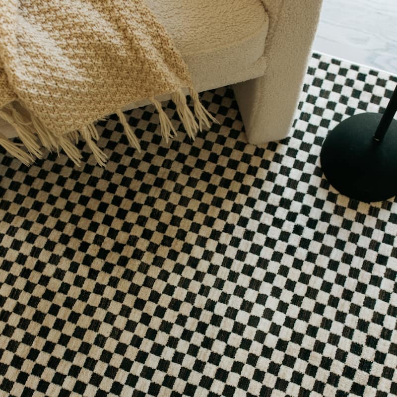 Hansel Two-Tone Checkerboard Black/ Ivory Area Rug