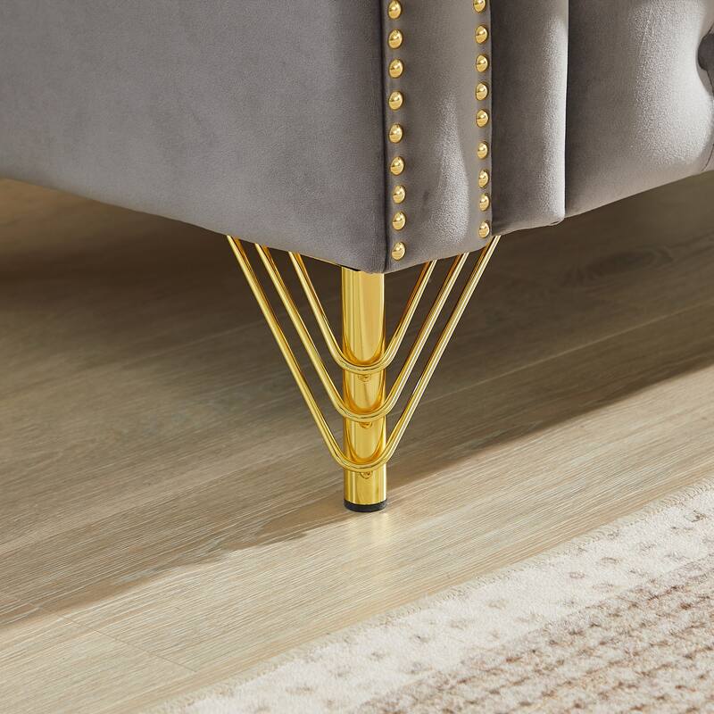 Chesterfield Sofa with Two Round Pillows, Featuring Copper Stud Detailing and Tufted Button Accents