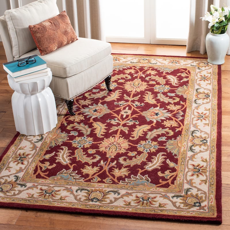SAFAVIEH Handmade Heritage Sharee Traditional Oriental Wool Rug - 4' x 6' - Red/Ivory