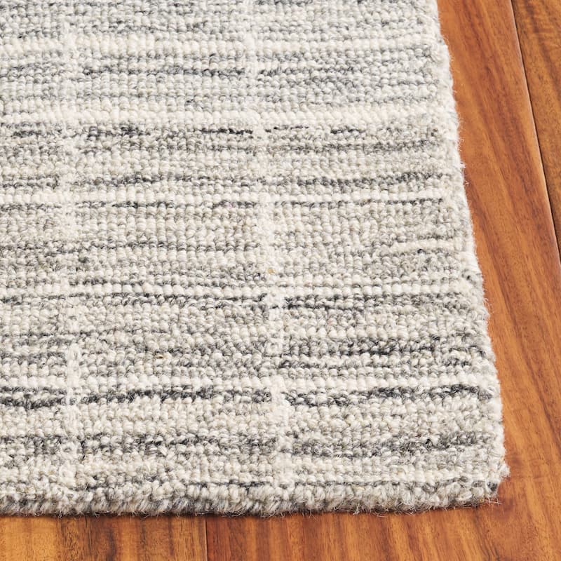SAFAVIEH Handmade Ebony Peigi Contemporary Wool Rug