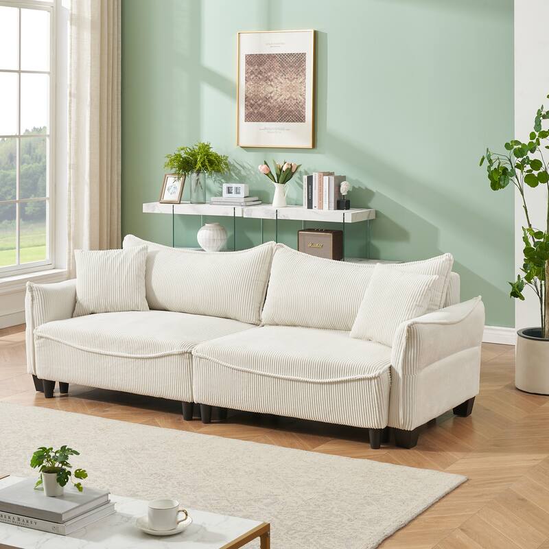 Beige Corduroy Sofa Convertible to Bed with Two Pillows