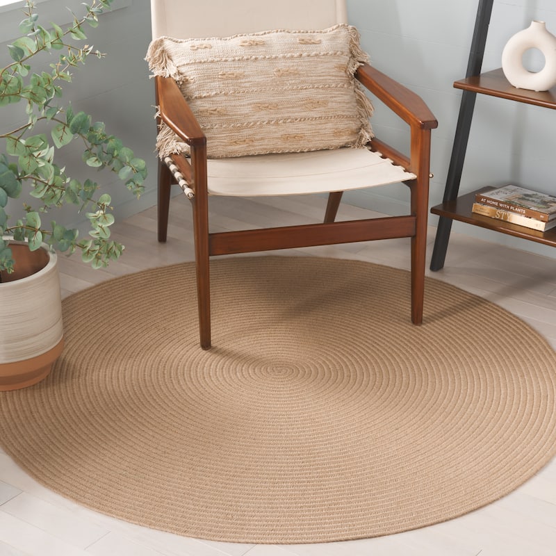 SAFAVIEH Handmade Braided Florika Jute Reversible Rug - 5' x 8' Oval - Natural