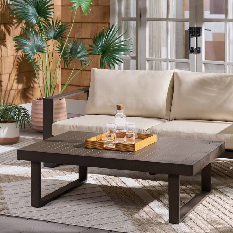 SAFAVIEH Outdoor Living Fash Aluminum Coffee Table - 50"W x 30"D x 16"H - Brown