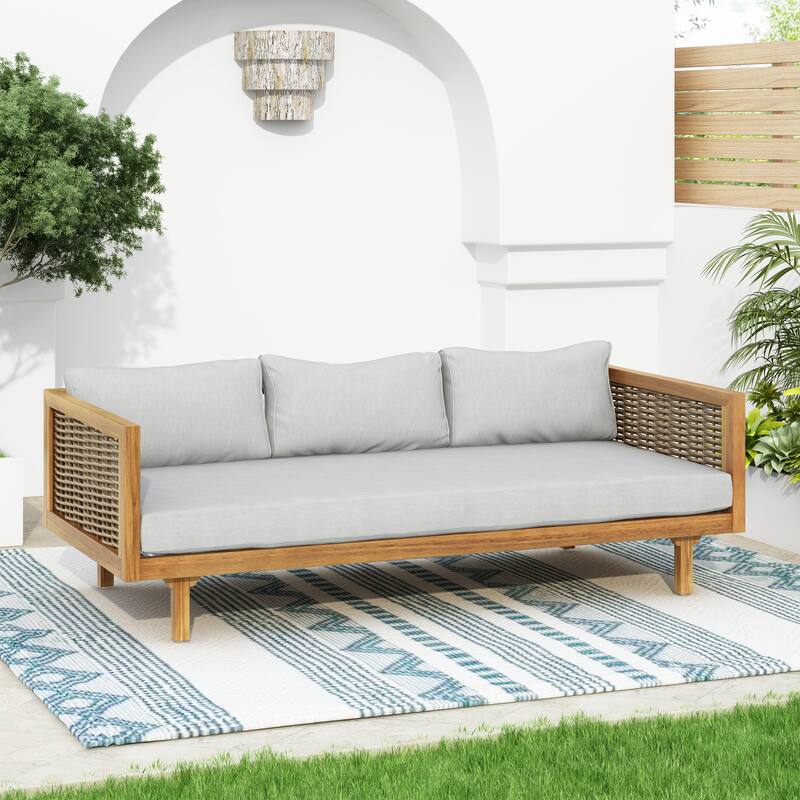 Acacia Wood Daybed with Rattan Arms Slat Paneling and Water Resistant Cushions